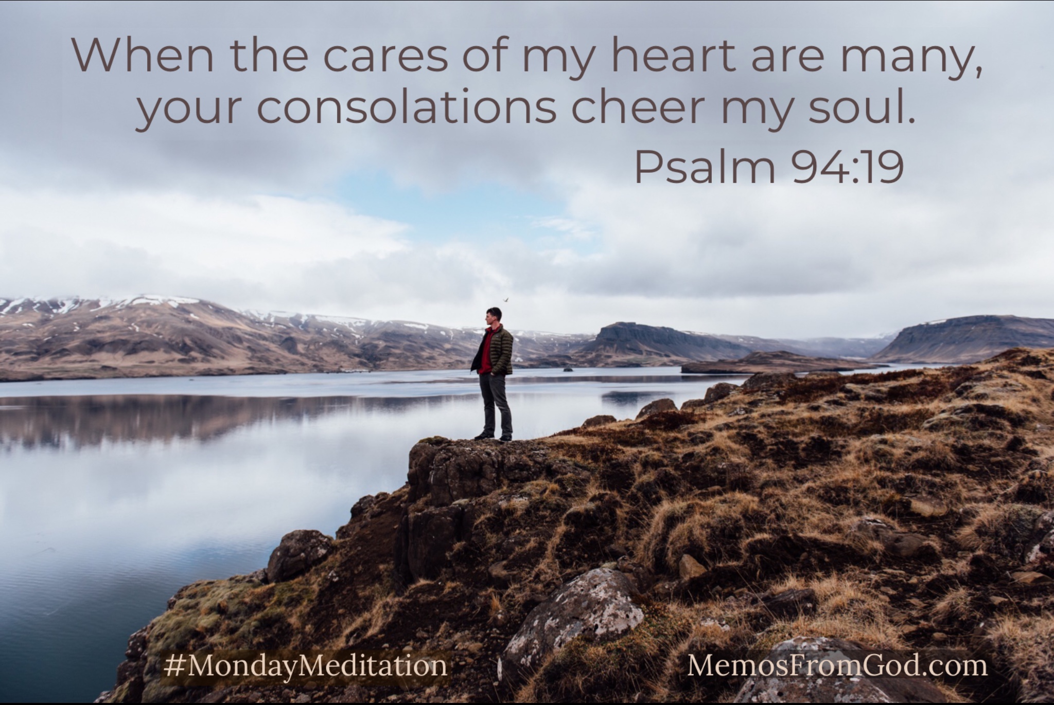 A man standing on a rocky shore looking out over calm water. Caption: When the cares of my heart are many, your consolations cheer my soul. Psalm 94:19