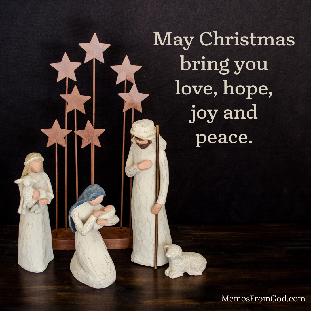 A carved nativity scene with stars in the background. Caption: May Christmas bring you love, hope, joy and peace.